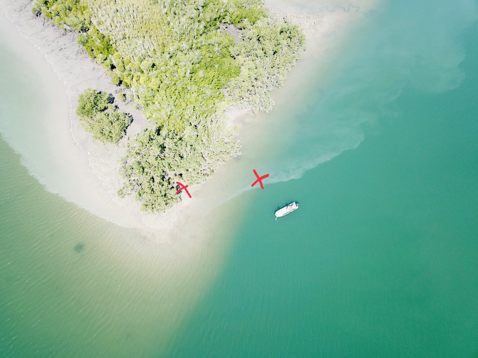 Drone view over turquoise Top End flats